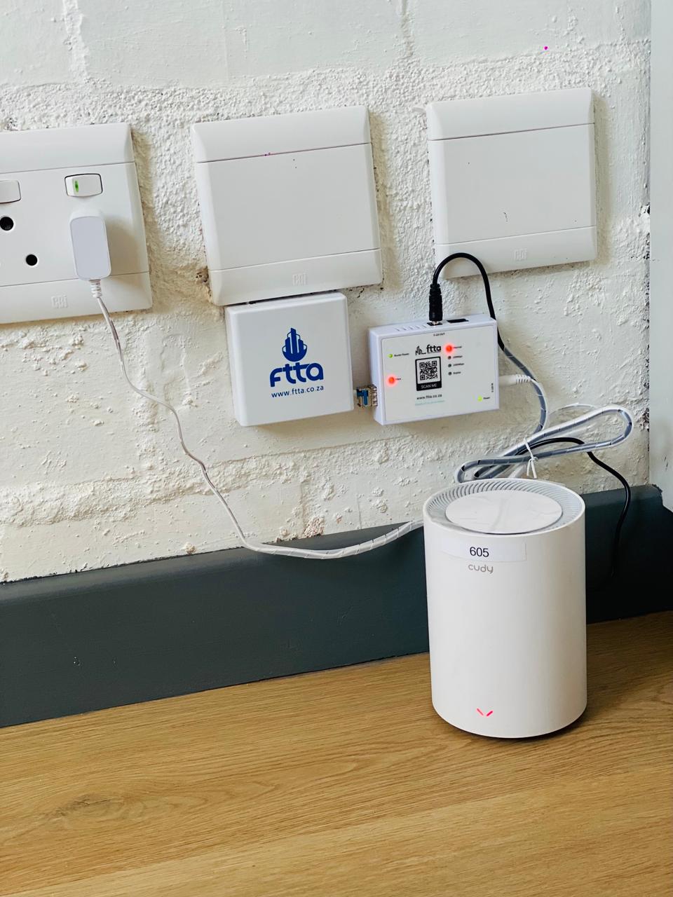 Fiber distribution box with green connectors